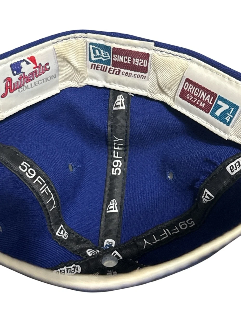 New Era Blue & Black Baseball Cap with White and Red 'T' Embroidery